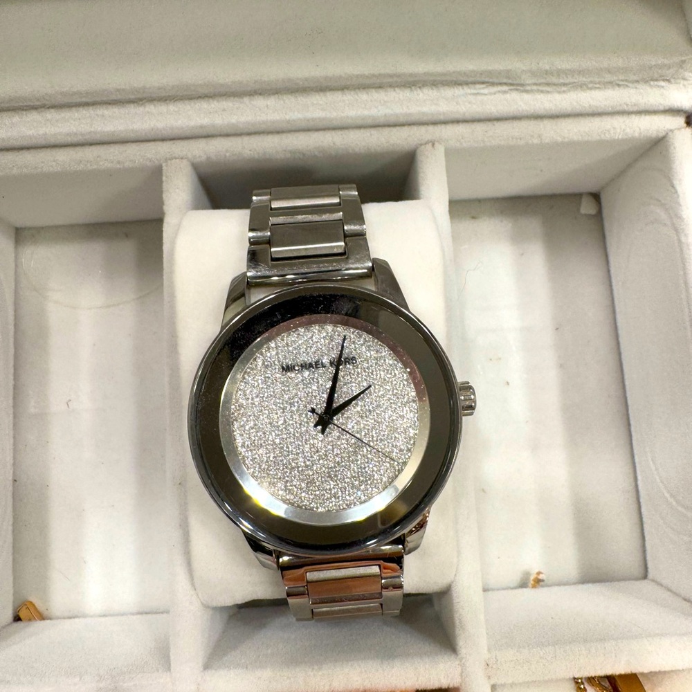 Silver MK watch with CZ watch face